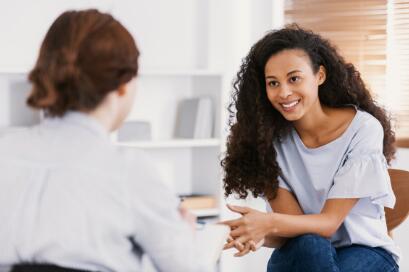 Female therapist talking to a female client